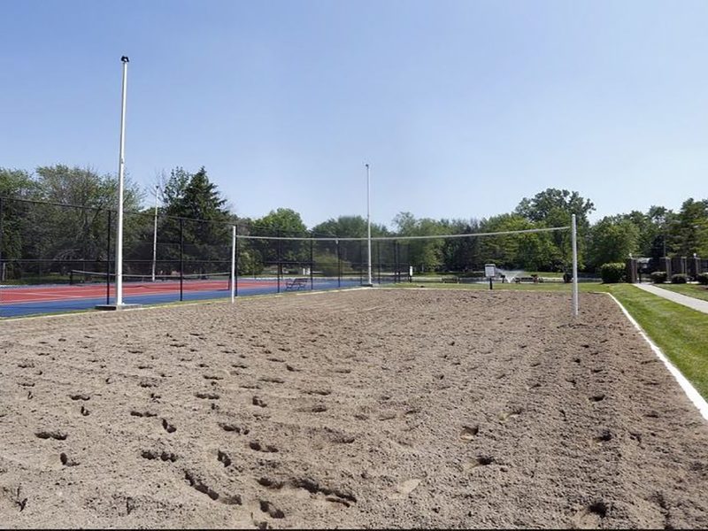 This image shows the premium community amenities, particularly the sand volleyball court with courtesy volleyballs featuring an ideal place for fun moments with family and friends. The volleyball court was accessible beside the tennis court.